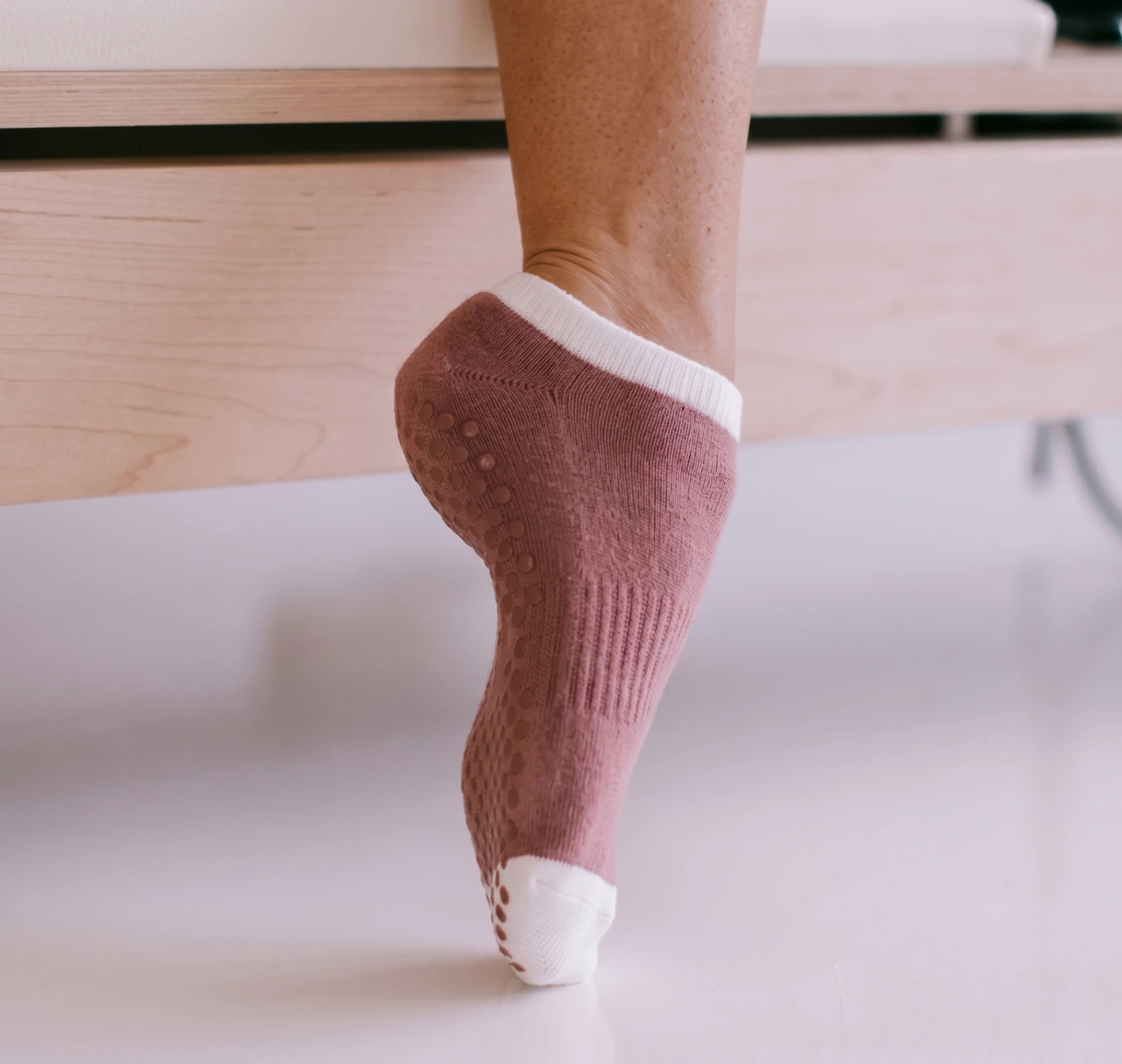 Custom low-rise Pilates grip socks with studio logo