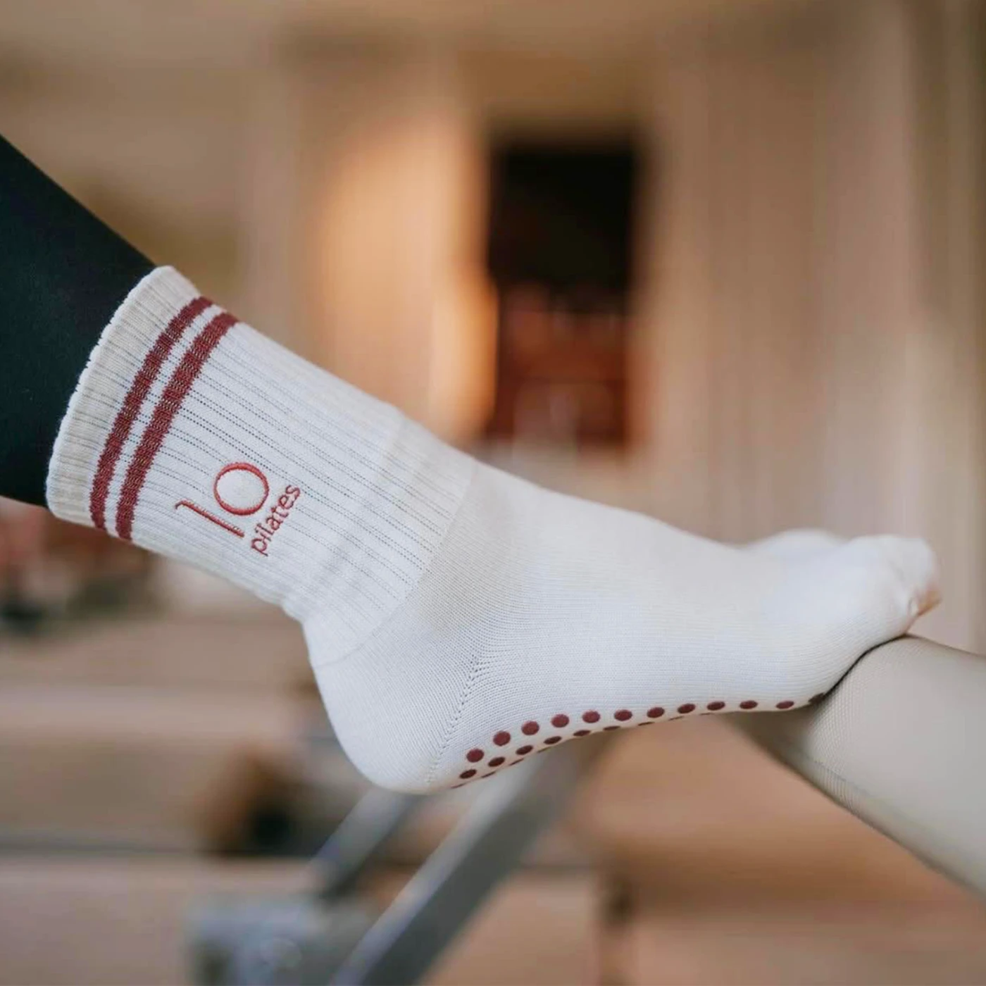 Custom mid-rise Pilates grip socks for reformer sessions